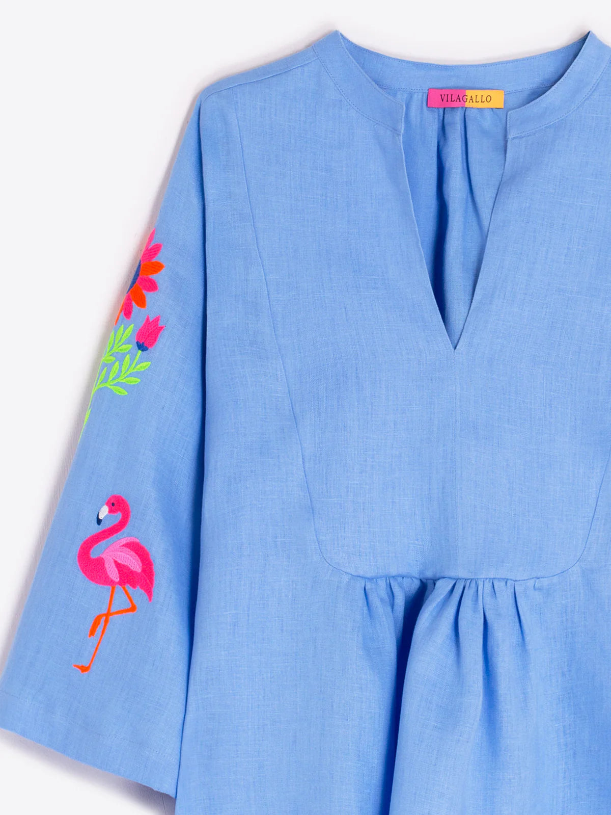 TOP WITH TROPICAL EMBROIDERED SLEEVES